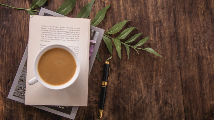 A carefully prepared cup of coffee on a warm wooden table